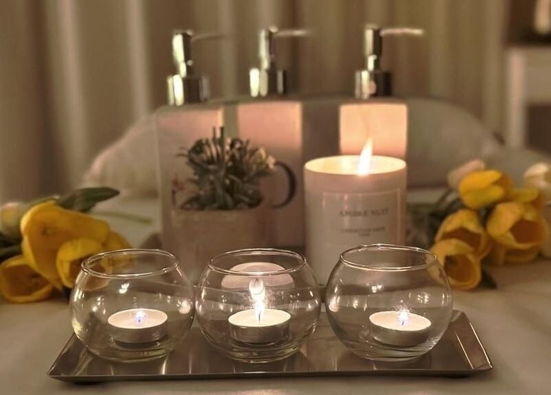 Scented candles and elegant decor at Chamomile Spa | كامومايل هوم سبا in Riyadh, Eastern Province, SA.
