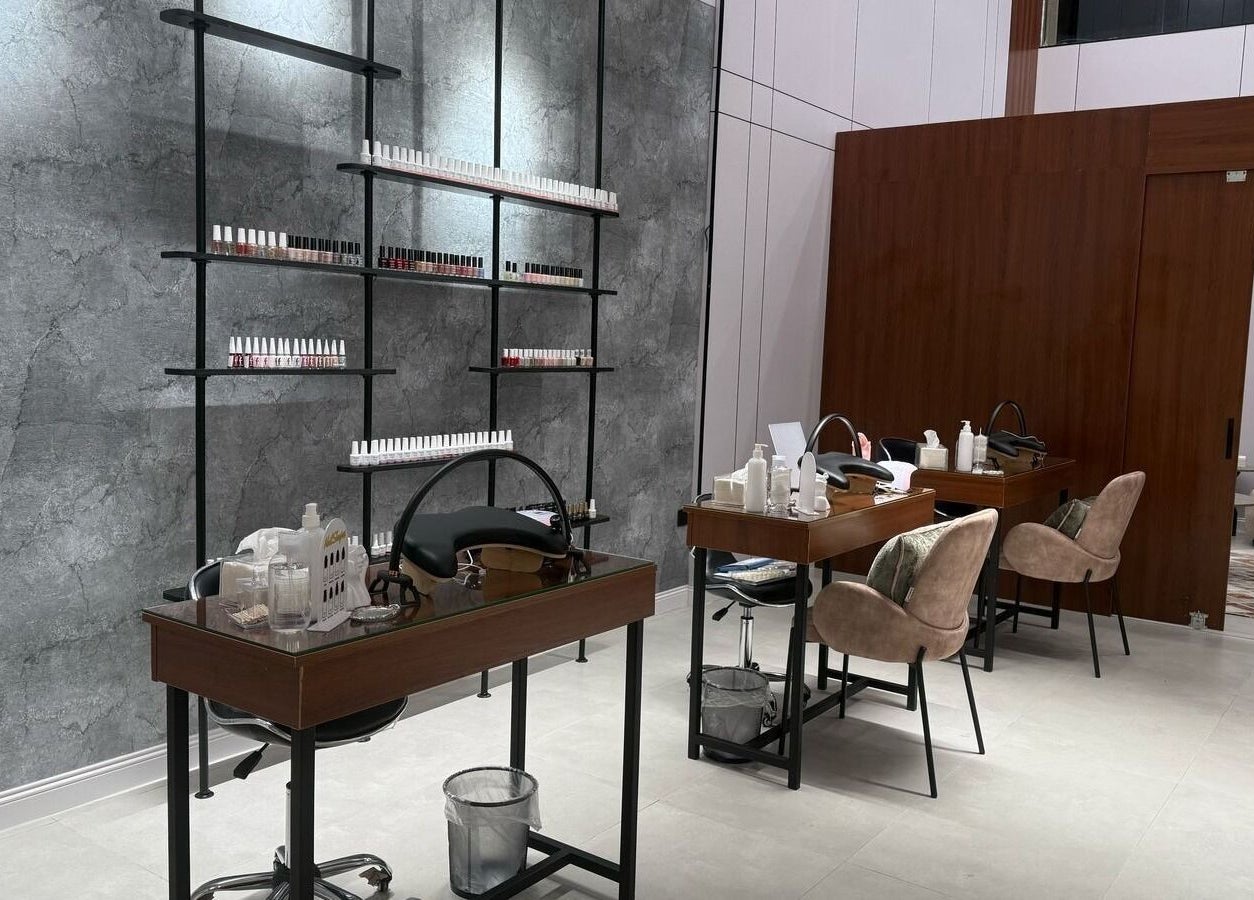 Modern nail care area at Mj Spa, Riyadh, Riyadh Province, SA, featuring stylish chairs and manicure stations.