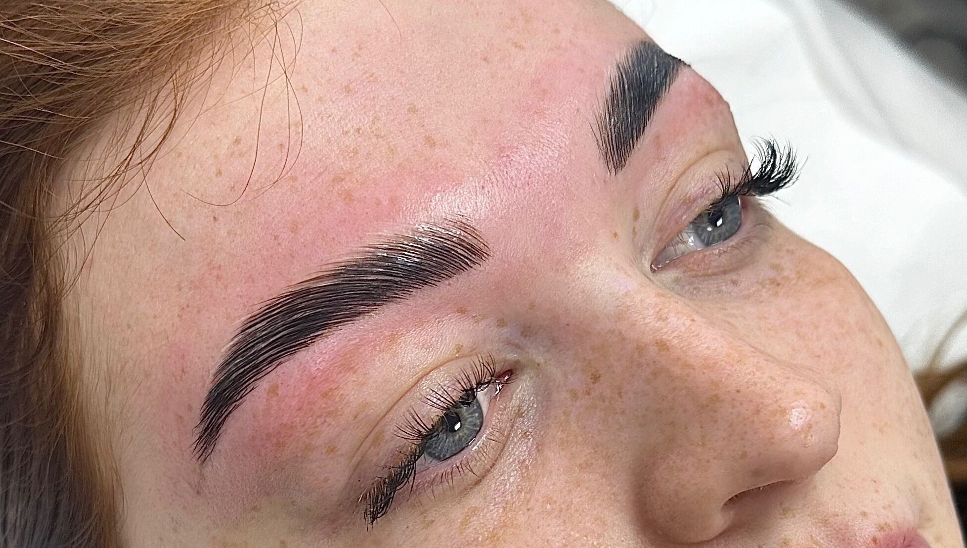 Close-up of perfectly shaped eyebrows at Penelope Ink & Co, Swinton, England, GB.