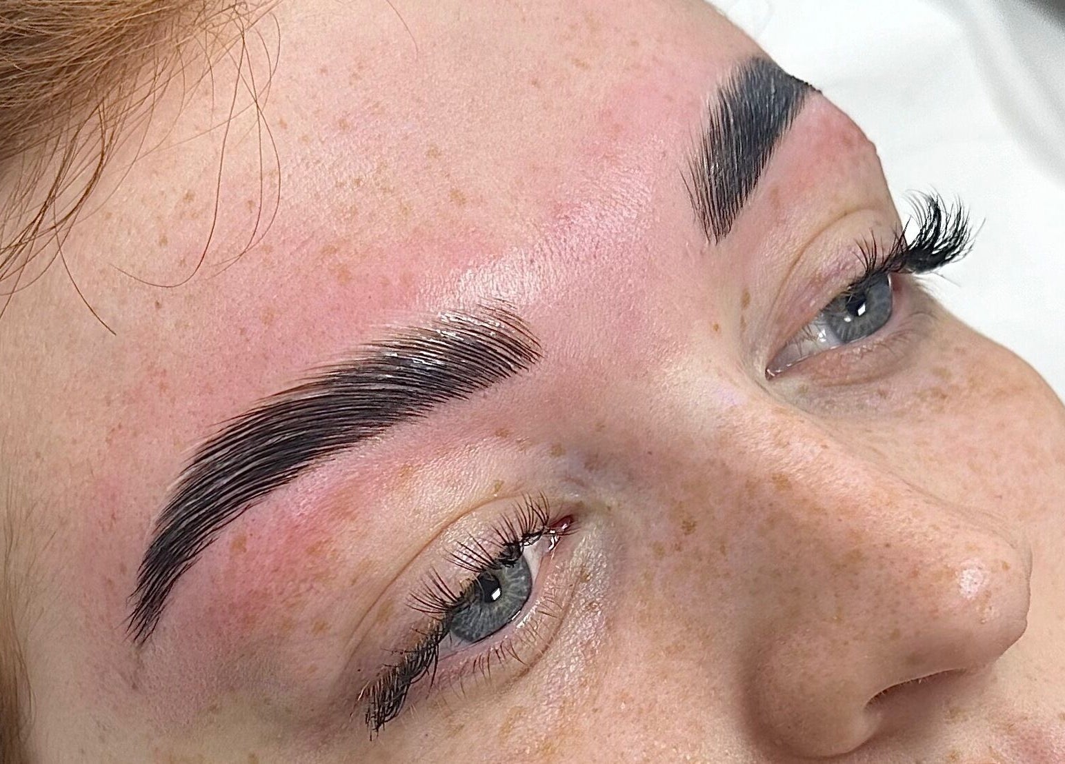 Close-up of perfectly shaped eyebrows at Penelope Ink & Co, Swinton, England, GB.