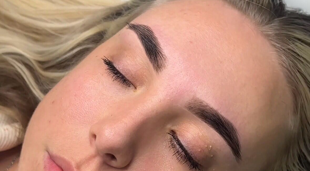 Close-up of expertly shaped eyebrows by Penelope Ink & Co, Swinton, England, GB.