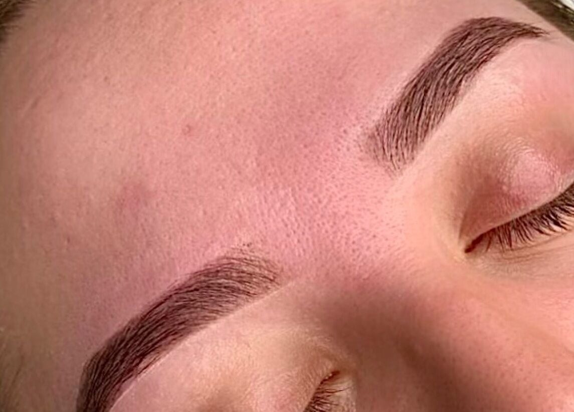 Close-up of expertly shaped eyebrows at Penelope Ink & Co, Swinton, England, GB.