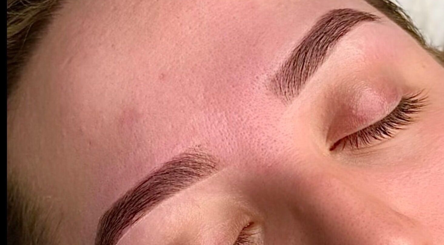 Close-up of expertly shaped eyebrows at Penelope Ink & Co, Swinton, England, GB.