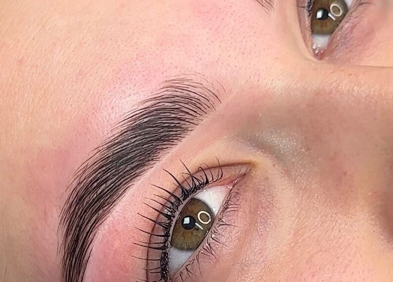 Close-up of expertly shaped eyebrows at Penelope Ink & Co, Swinton, England, GB.