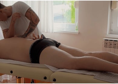 Massage therapy session at Iv's Breathwork in Totteridge & Whetstone, England, GB, focusing on back relaxation.