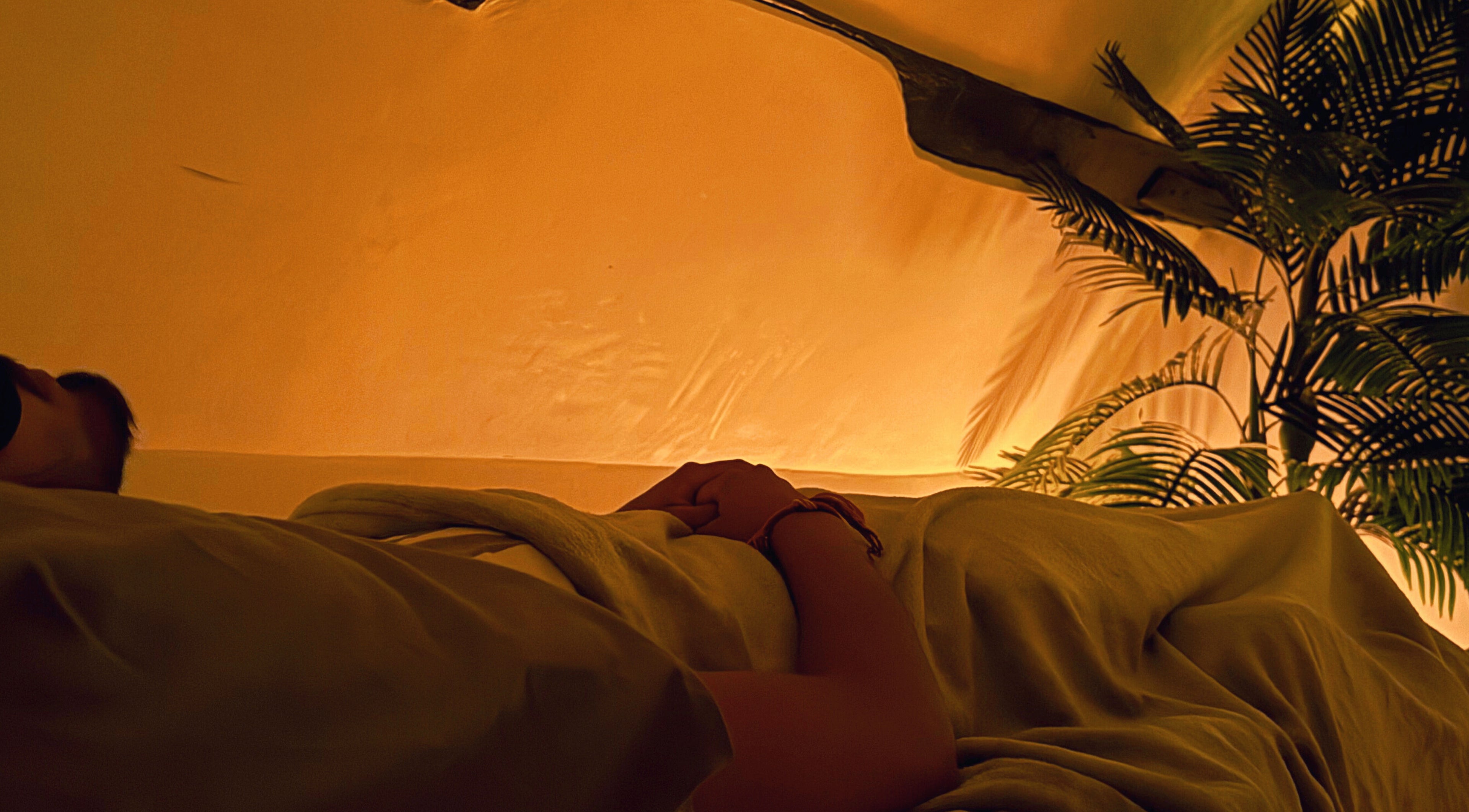 Relaxing ambiance at Iv's Breathwork, Totteridge & Whetstone, England, GB, with warm lighting and plants.