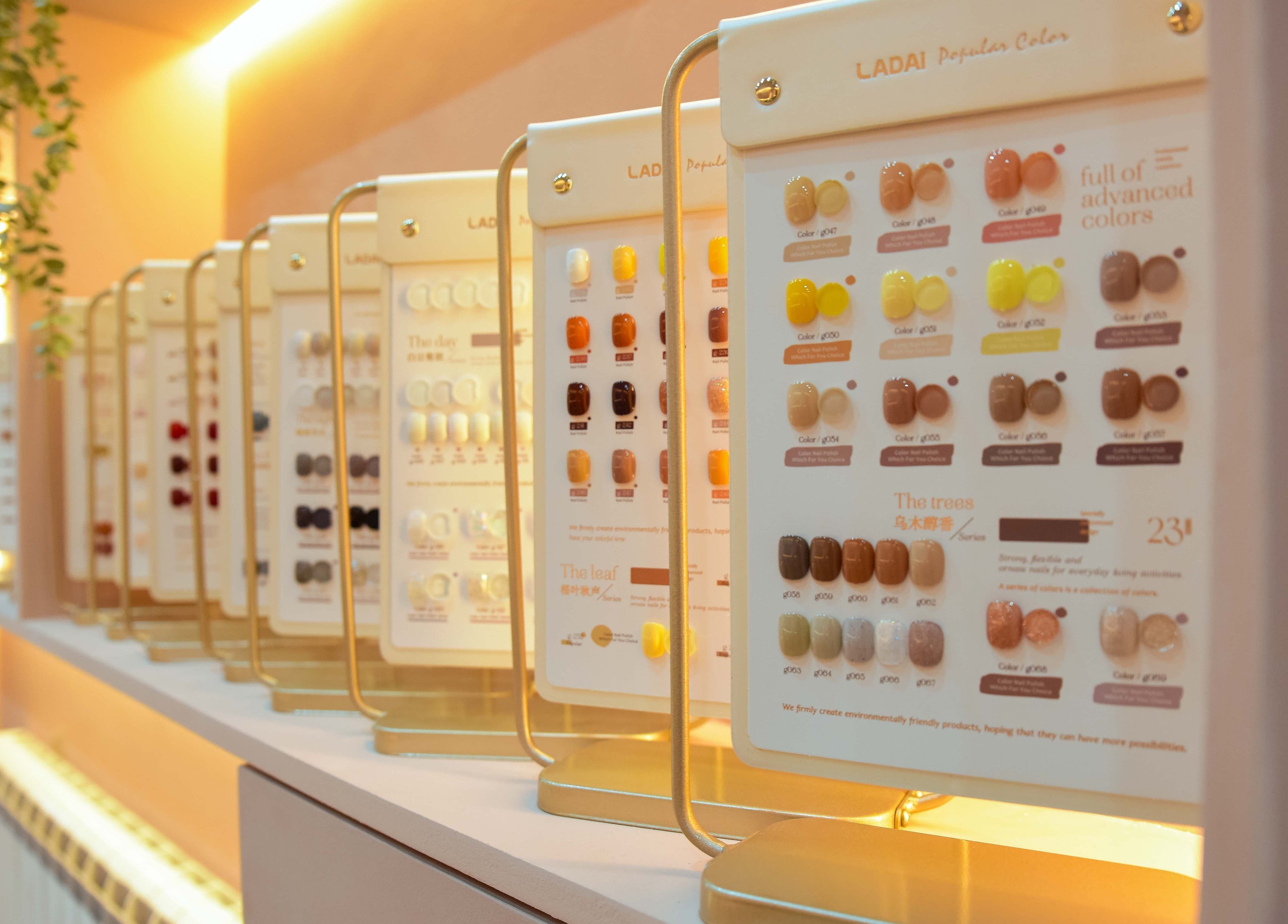 Nail color palettes at Beauchamp Nails Bar, London, England, GB, showcasing various shades and styles.