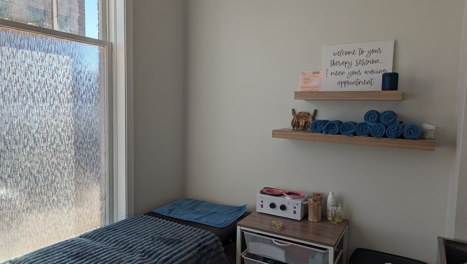 Calm waxing room at The Backdoor Wax Studio in Trail, British Columbia, CA, with cozy setup and decor.