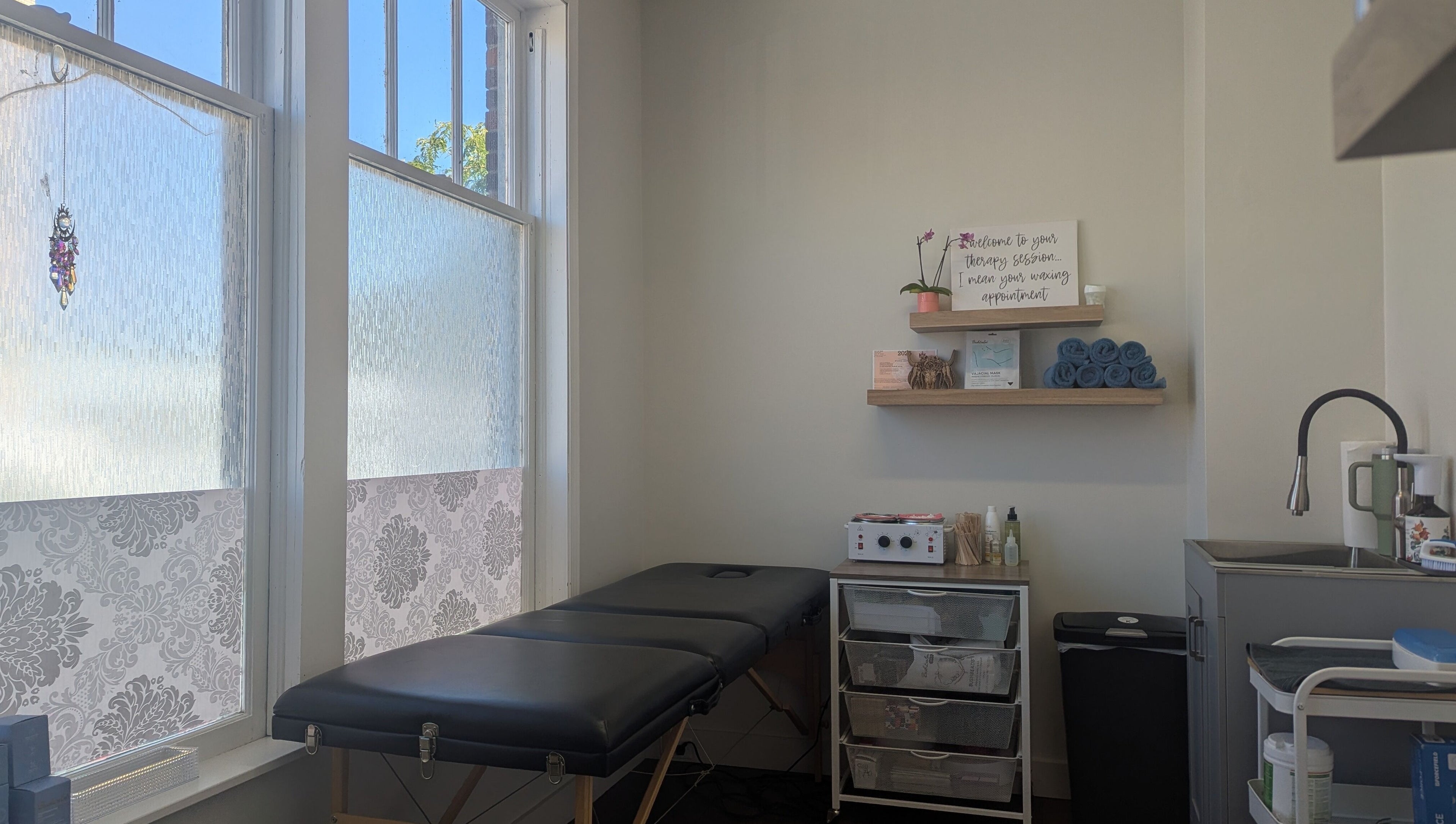 Welcoming wax room at The Backdoor Wax Studio, Trail, British Columbia, CA. Tranquil and well-equipped space.