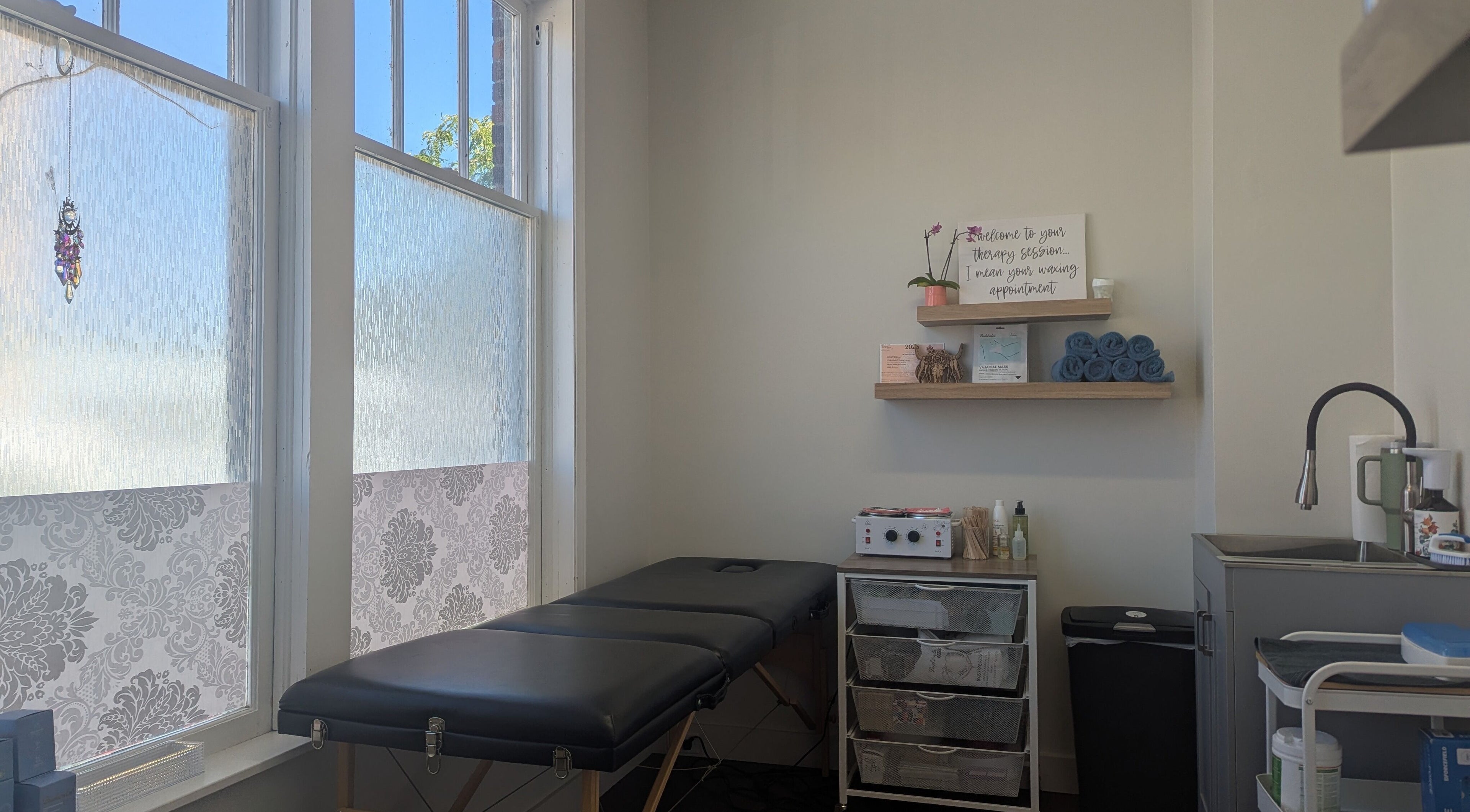 Welcoming wax room at The Backdoor Wax Studio, Trail, British Columbia, CA. Tranquil and well-equipped space.