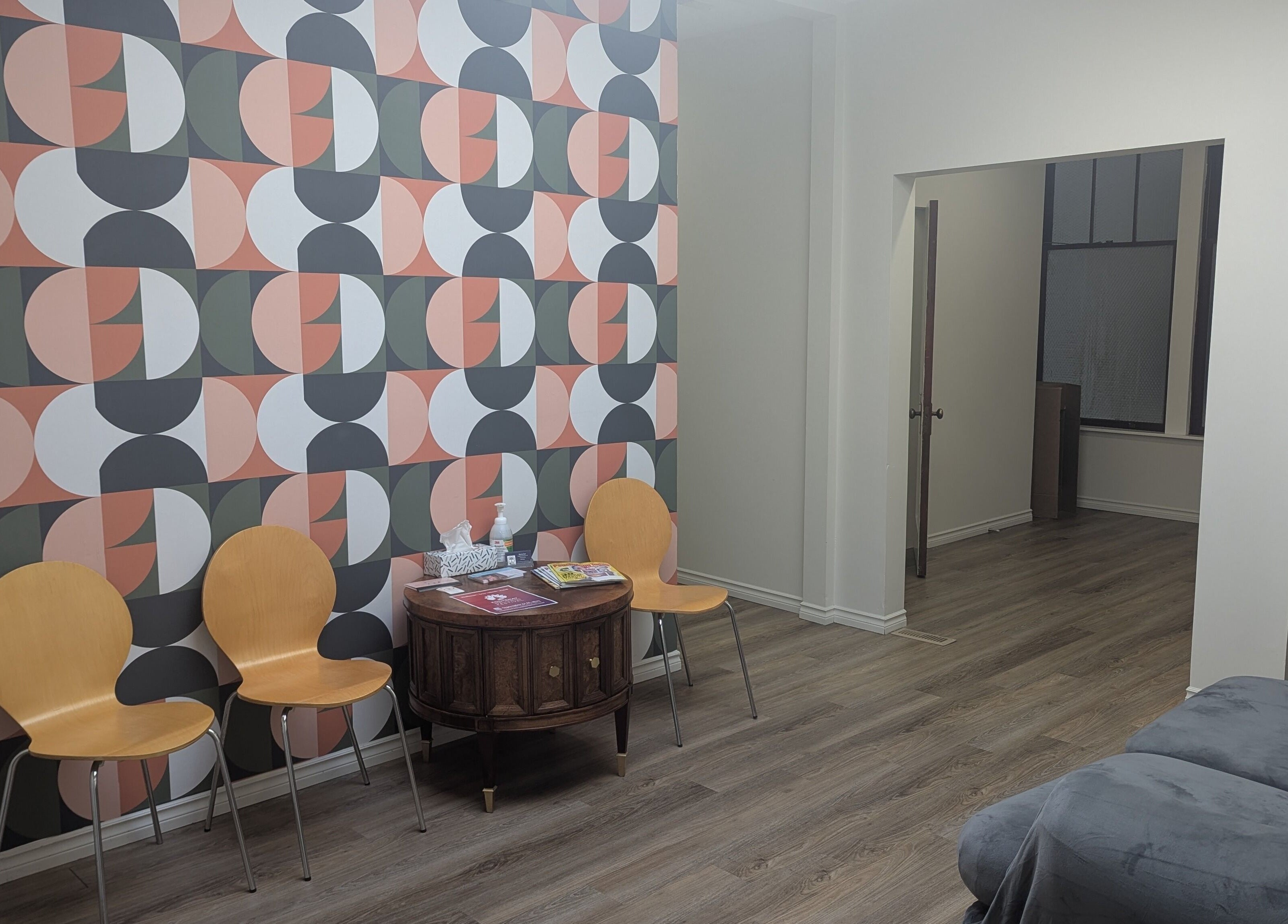 Stylish waiting area at The Backdoor Wax Studio in Trail, British Columbia, CA with modern decor.