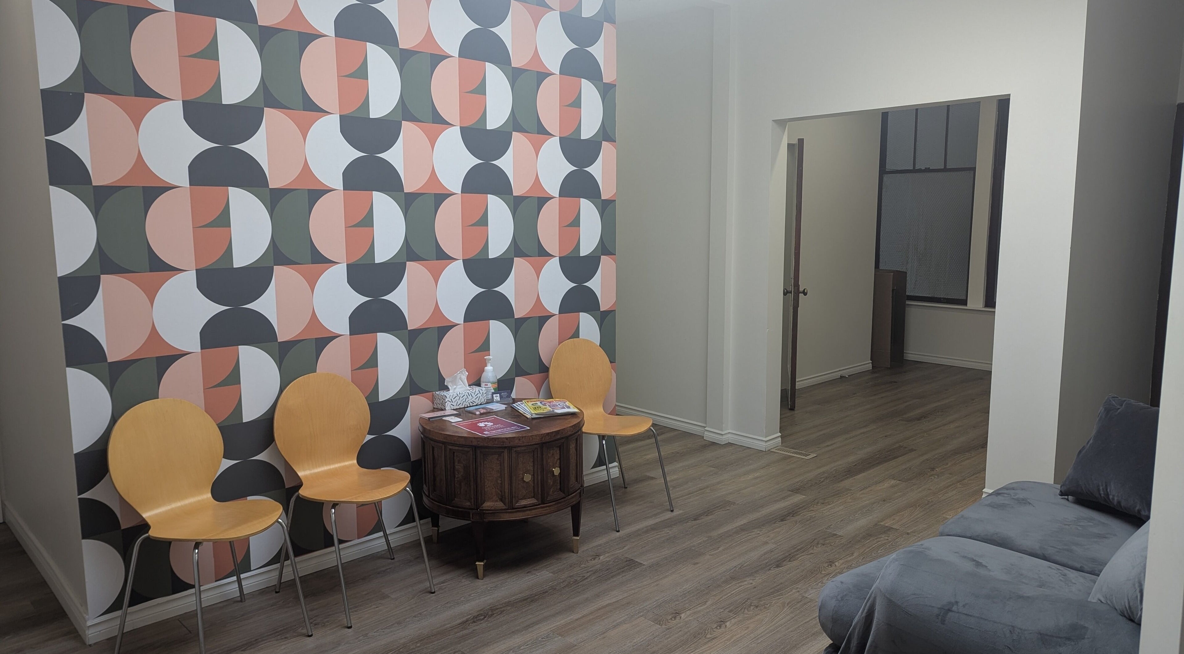 Stylish waiting area at The Backdoor Wax Studio in Trail, British Columbia, CA with modern decor.