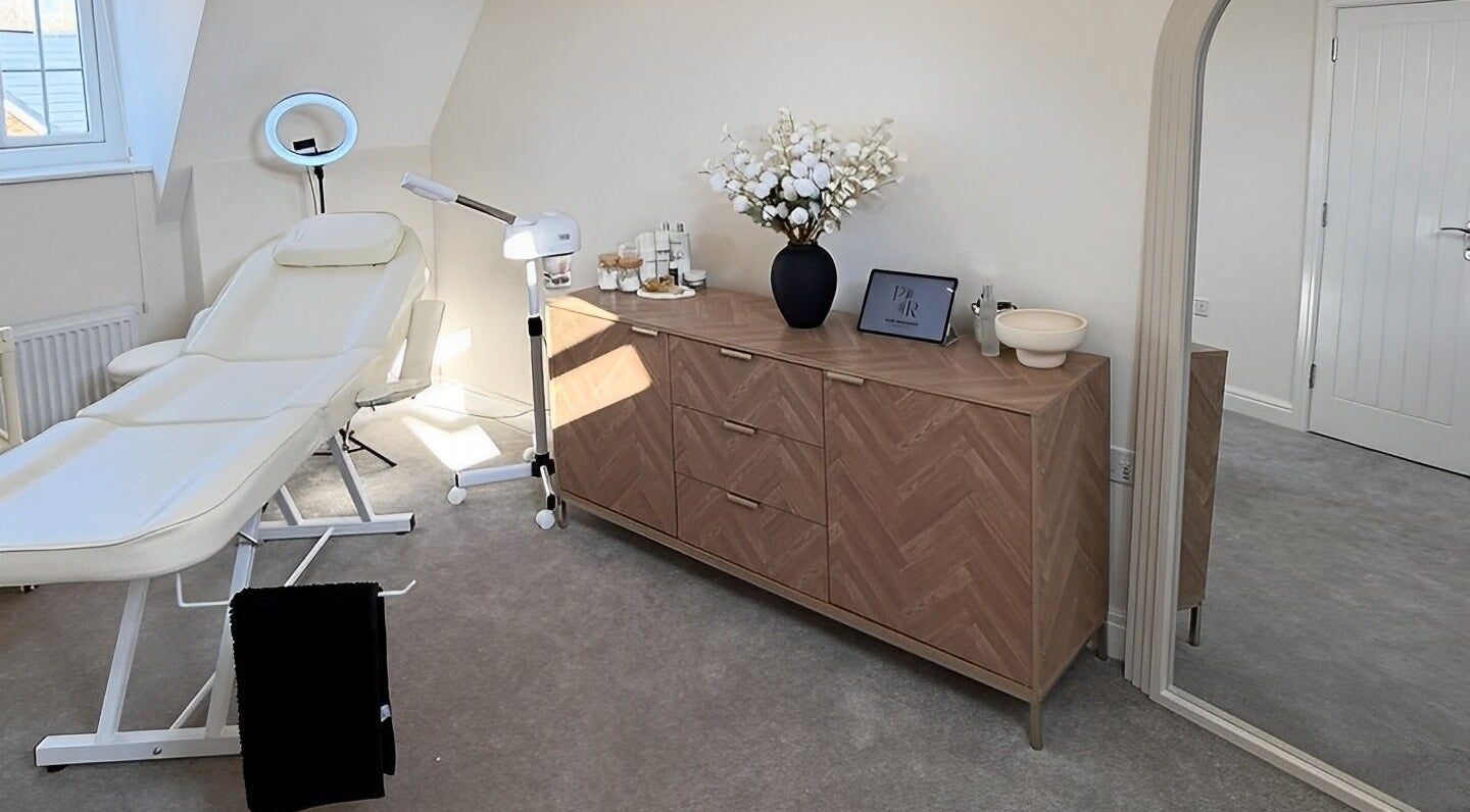 Tranquil therapy room at Pure Radiance Skincare, Leigh, England, GB, featuring a comfy treatment bed.
