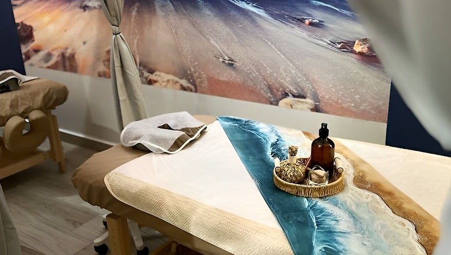 Relaxing massage room at Talay Thai Massage Therapy, Quarteira, Faro, PT with ocean-themed decor.