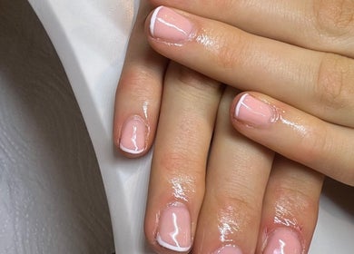 Elegant French manicure at Nailsbymaddymae, Brighton And Hove, England, GB. Perfectly polished nails.