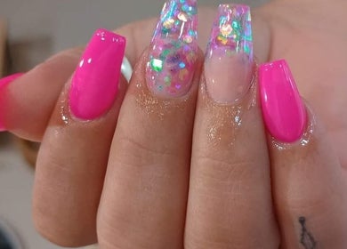 Vibrant pink and glitter nails at Karissa in Grove, Oklahoma, US.