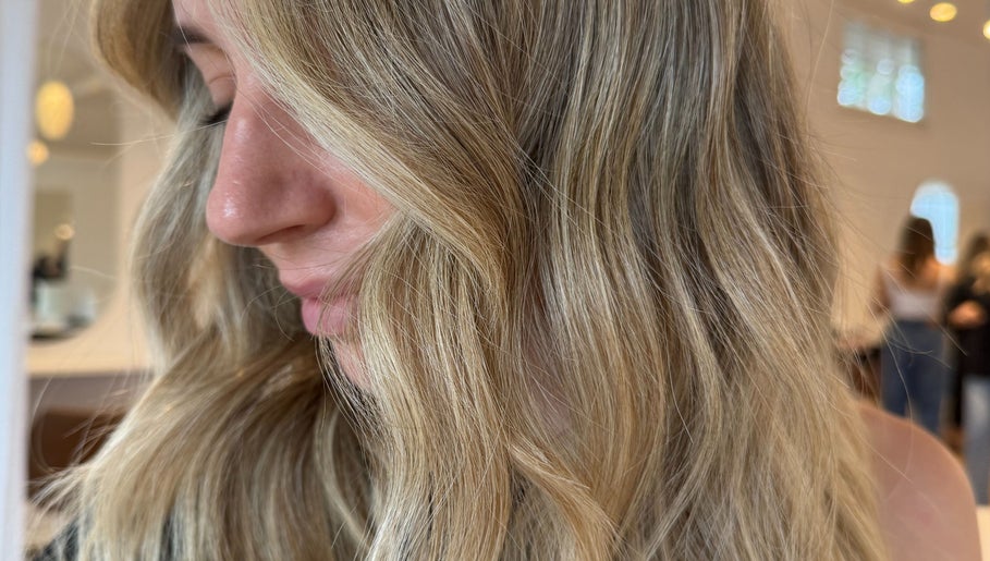 Blonde hair styled in soft waves at Studio Lumee, Everton Park, Queensland, AU.