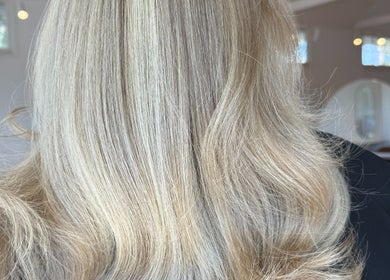 Blonde hair styled in soft waves at Studio Lumee, Everton Park, Queensland, AU