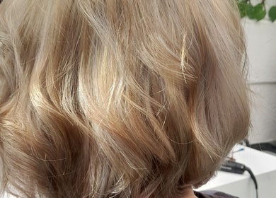 Styled blonde hair at Hair by Me, Cape Town, Western Cape, ZA showcasing expert salon techniques.