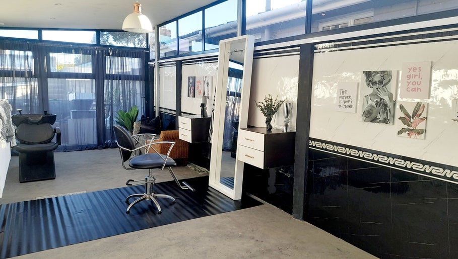 Modern salon interior at Hair by Me, Cape Town, Western Cape, ZA, featuring stylish decor and spacious design.