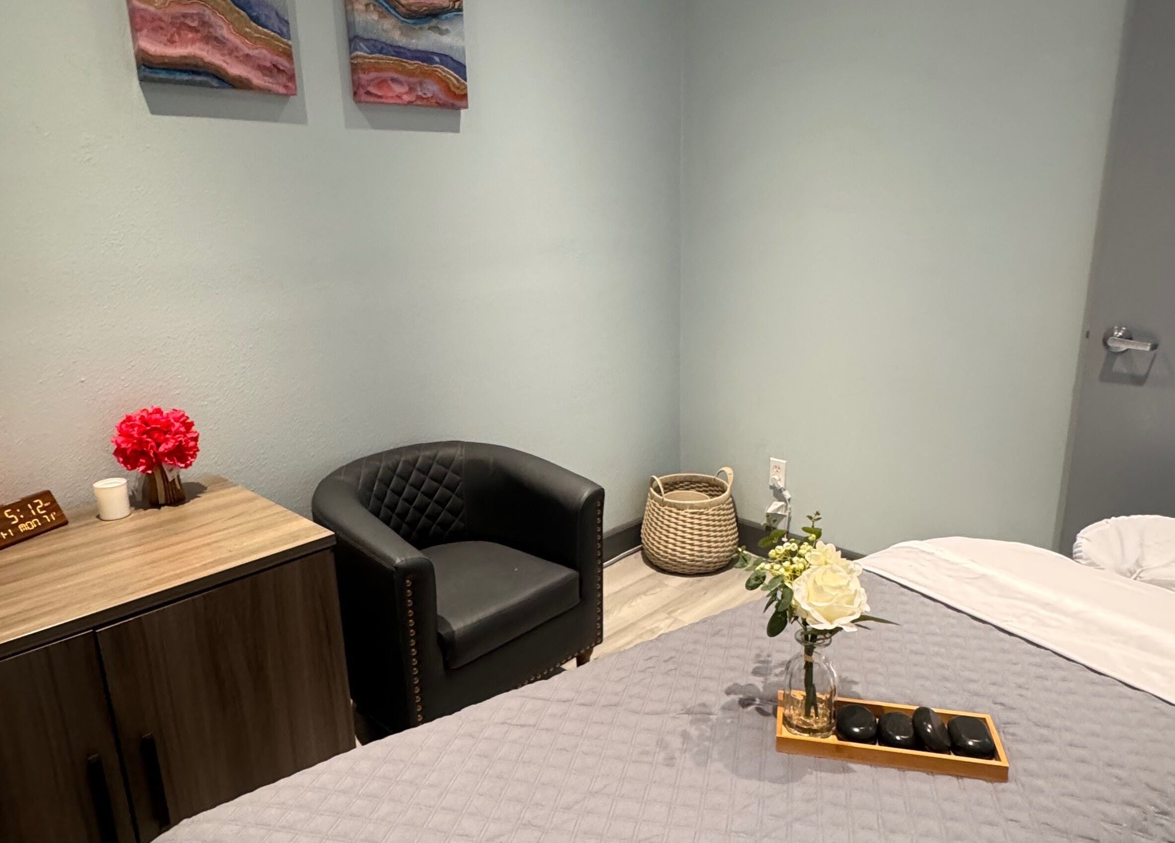 Cozy massage room at Youglow Wellness & Spa, Torrance, California, US, featuring a massage table and elegant decor.