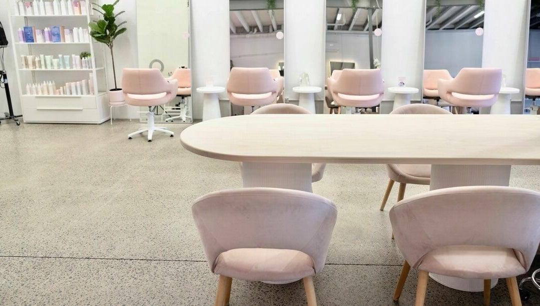 Elegant salon seating area at Rapunzel Rapunzel, North Lakes, Queensland, AU showcasing modern design.