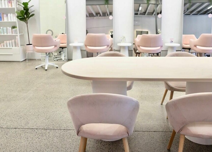 Elegant salon seating area at Rapunzel Rapunzel, North Lakes, Queensland, AU showcasing modern design.