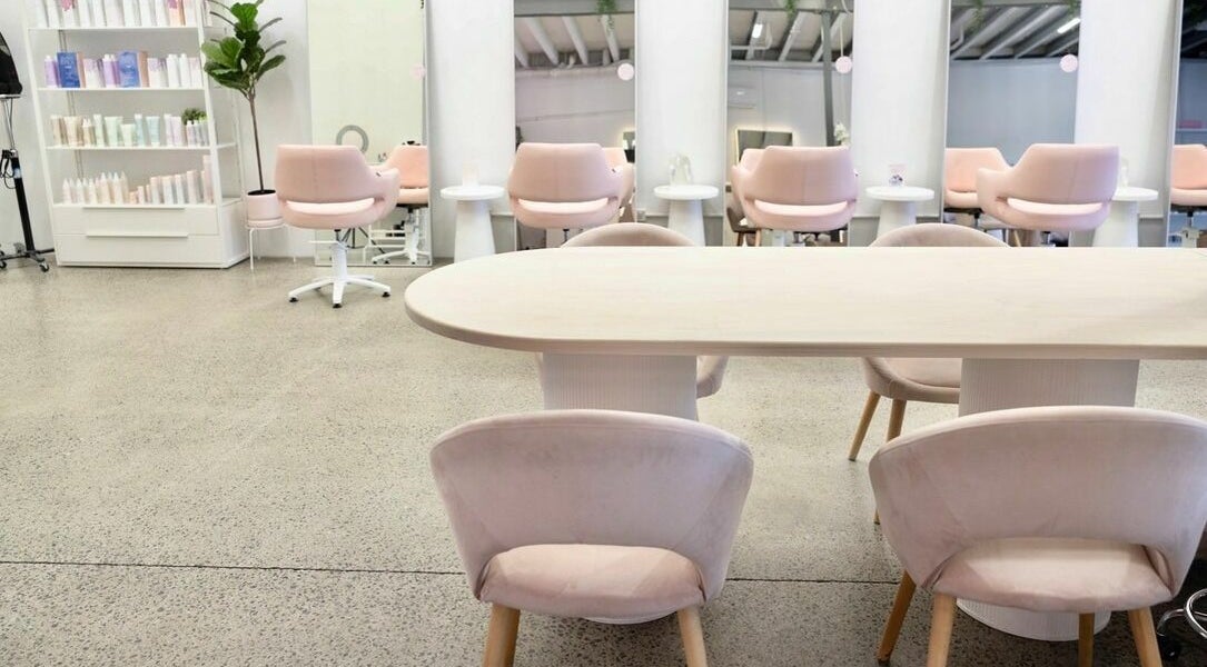 Elegant salon seating area at Rapunzel Rapunzel, North Lakes, Queensland, AU showcasing modern design.