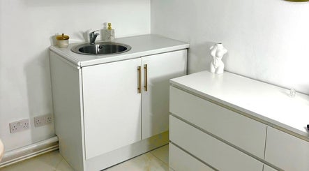 Elegant counter space with sink and minimalist decor at The Sculpt Studio EST 2018, Sketty, Wales, GB.