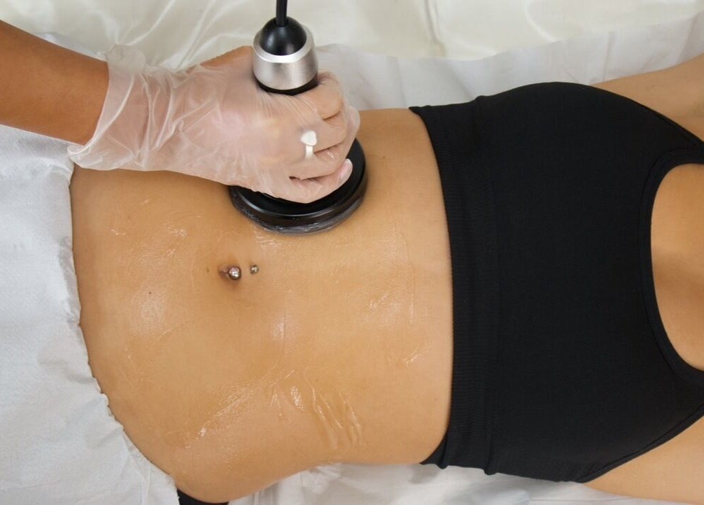 Body contouring session at The Sculpt Studio EST 2018, Sketty, Wales, GB, featuring advanced technology.