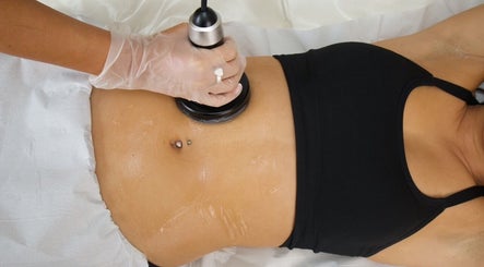 Body contouring session at The Sculpt Studio EST 2018, Sketty, Wales, GB, featuring advanced technology.