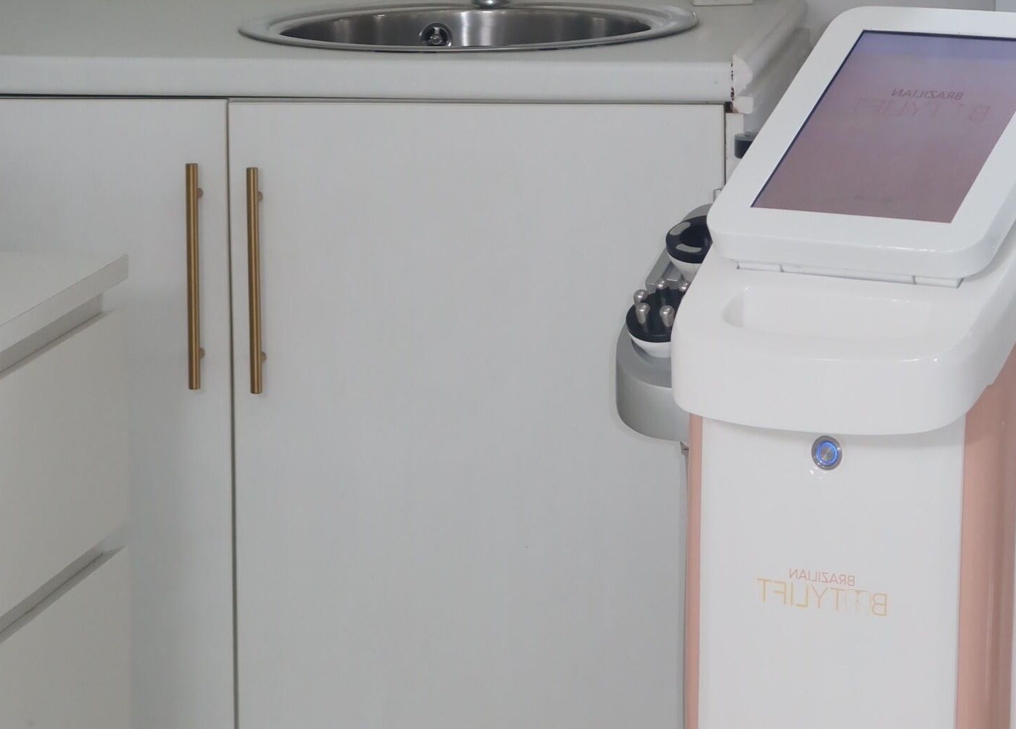 Modern aesthetic equipment at The Sculpt Studio EST 2018, Sketty, Wales, GB, showcasing sleek design.