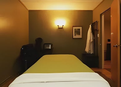 Tranquil massage room at Well Being Akron by Korey Cleaver in Akron, Ohio, US, featuring a soothing ambiance.