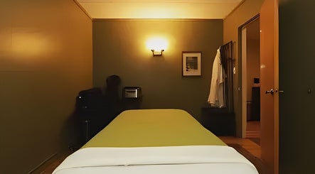 Tranquil massage room at Well Being Akron by Korey Cleaver in Akron, Ohio, US, featuring a soothing ambiance.