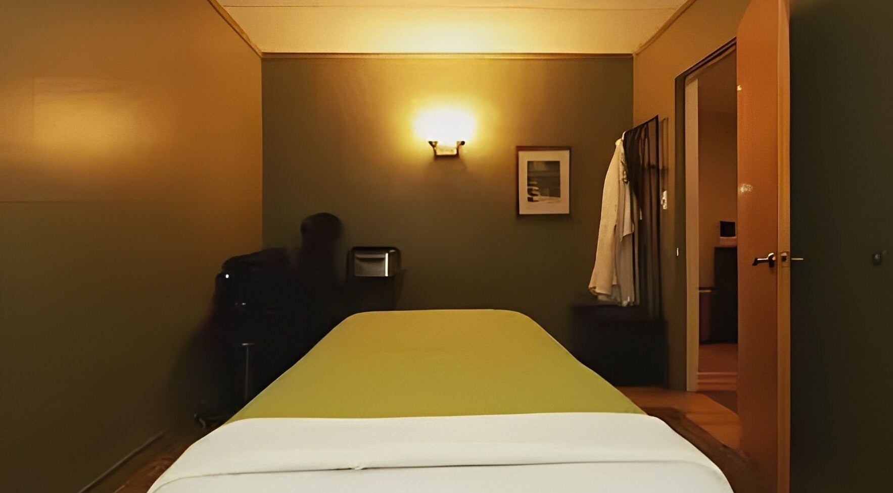 Tranquil massage room at Well Being Akron by Korey Cleaver in Akron, Ohio, US, featuring a soothing ambiance.