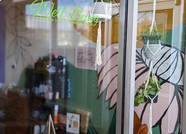 Entrance to Licensed Massage Therapist Korey Cleaver at Well Being Akron, Akron, Ohio, US with macrame decor.