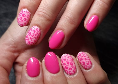 Stylish pink leopard print nails at In The Buff by Marizelle, Cape Town, Western Cape, ZA.