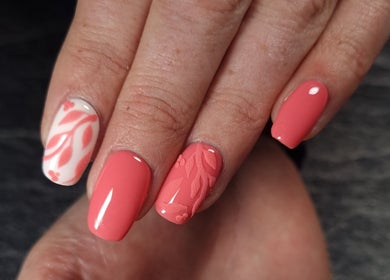 Elegant coral nail art at In The Buff by Marizelle in Cape Town, Western Cape, ZA.