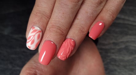 Elegant coral nail art at In The Buff by Marizelle in Cape Town, Western Cape, ZA.