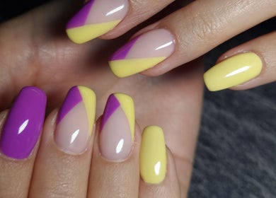Stylish purple and yellow nails at In The Buff by Marizelle, Cape Town, Western Cape, ZA.