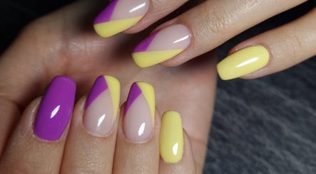Stylish purple and yellow nails at In The Buff by Marizelle, Cape Town, Western Cape, ZA.
