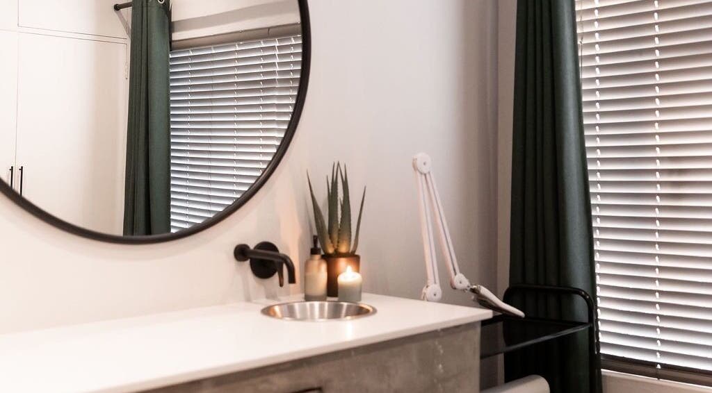 Chic treatment room at Duet Aesthetics Laser & Beauty, Lydenburg, Mpumalanga, ZA with mirror and candles.