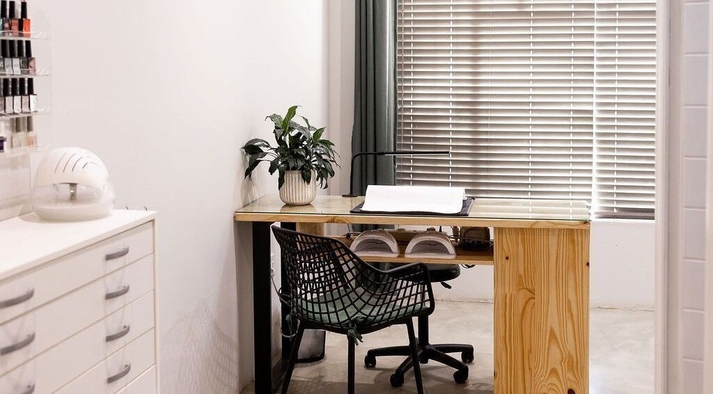 Cozy nail station at Duet Aesthetics Laser & Beauty, Lydenburg, Mpumalanga, ZA with plants and modern decor.