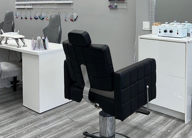 Modern salon chairs at Diamond Beauty, Surrey, British Columbia, CA, showcasing elegance and style.