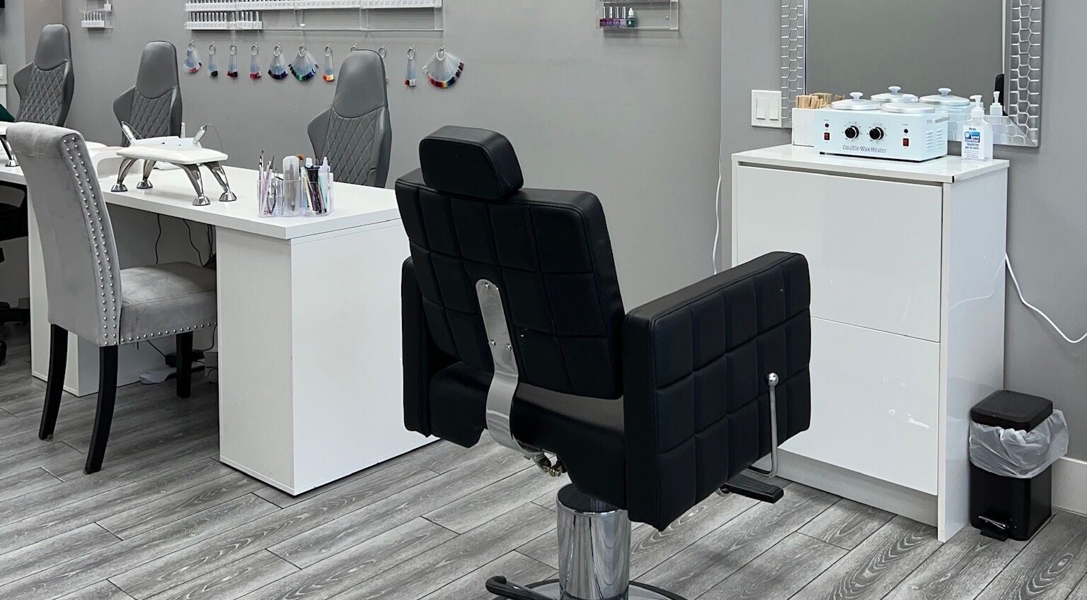 Modern salon chairs at Diamond Beauty, Surrey, British Columbia, CA, showcasing elegance and style.