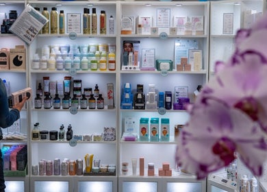 Diverse beauty products displayed on shelves at Diamond Beauty in Surrey, British Columbia, CA.