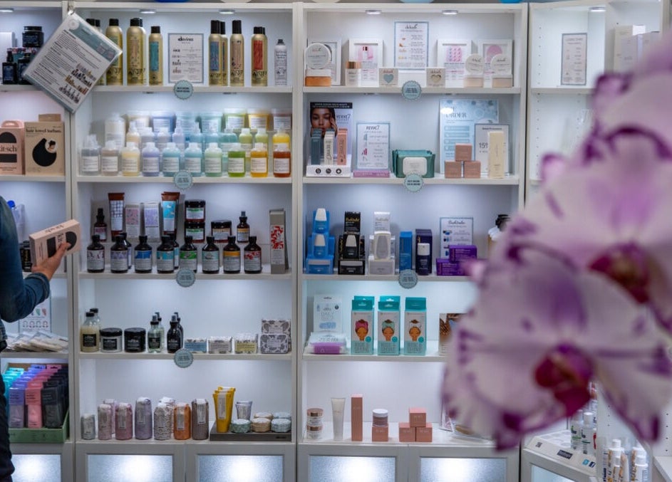 Diverse beauty products displayed on shelves at Diamond Beauty in Surrey, British Columbia, CA.
