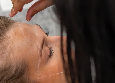 Eyebrow threading at Diamond Beauty, Surrey, British Columbia, CA for precise brow shaping and style.