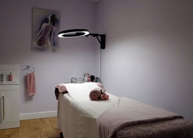 Tranquil spa room at Erika’s Beauty in Derby, England, GB with a treatment bed and calming decor.