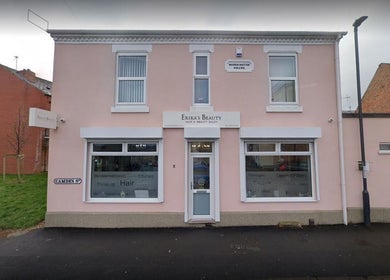 Front view of Erika's Beauty, a charming pink salon in Derby, England, GB.